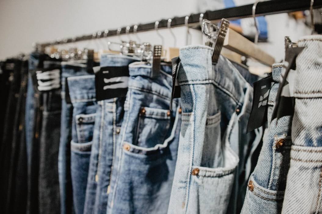 https://hermoney.com/wp-content/uploads/2022/07/close-up-of-denim-jeans-in-the-store_t20_moyvdd.jpg