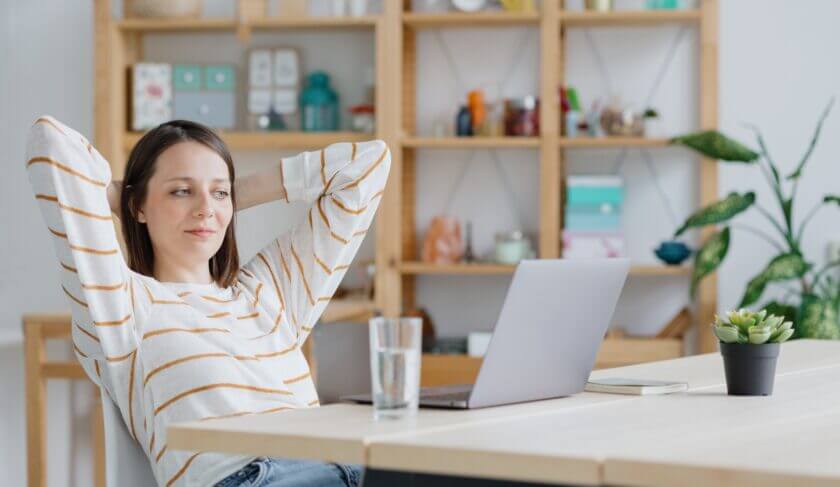 Woman at a computer learning about investing