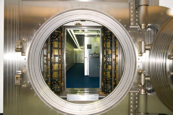 inside of a bank vault with the door open