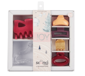 A gift set is pictured with six different claw clips for hair.